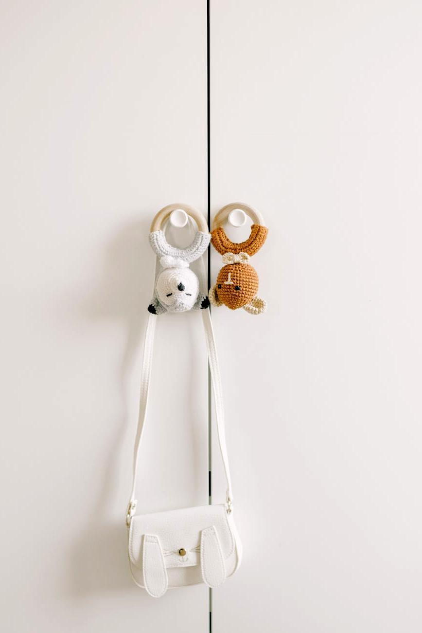 Soft baby knitted blankets and children accessories displayed