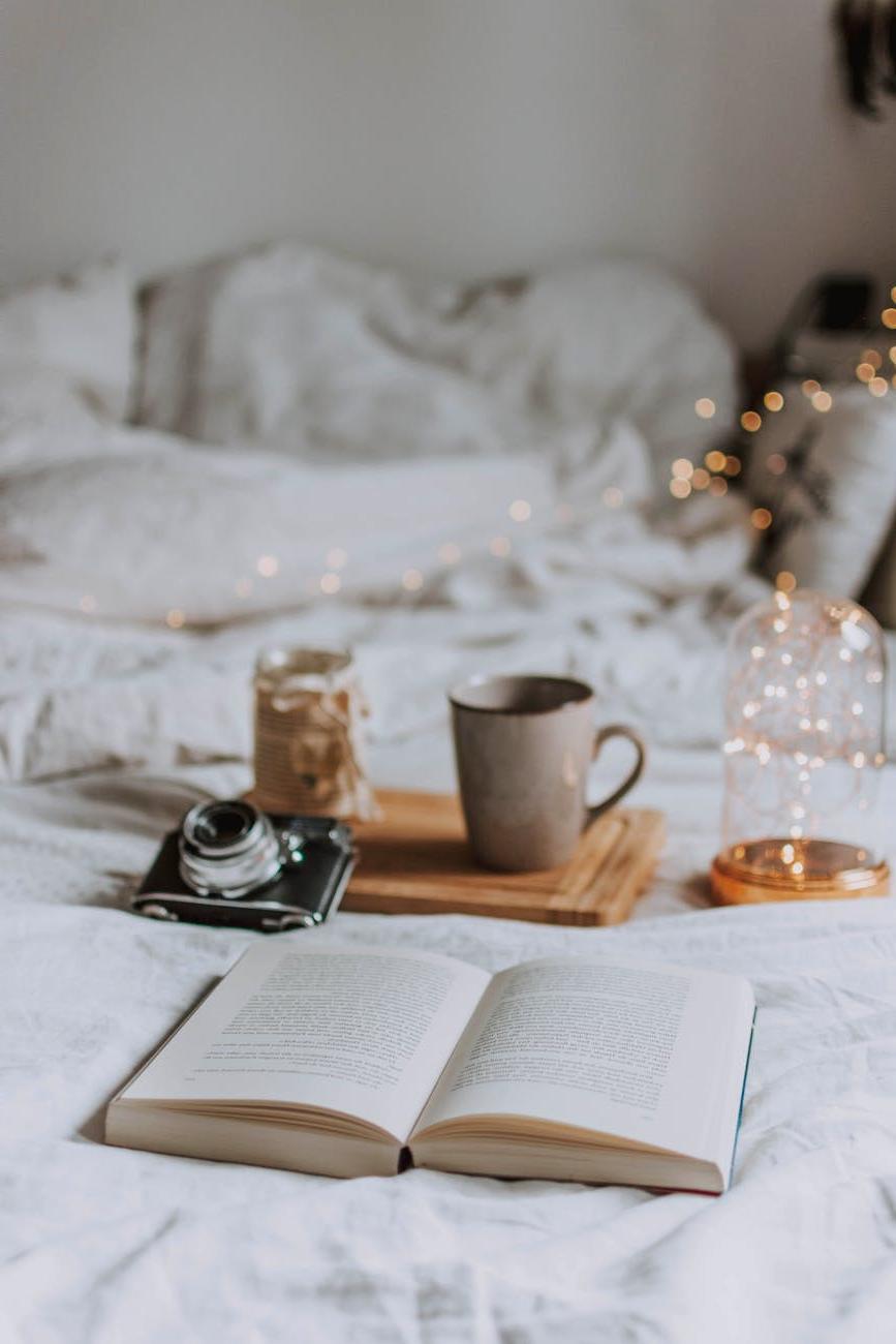 Artisan hand-knitting a personalized baby blanket with organic cotton yarn