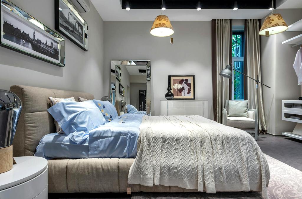 Intricate hand-knitted cushions with Nordic patterns on cozy sofa